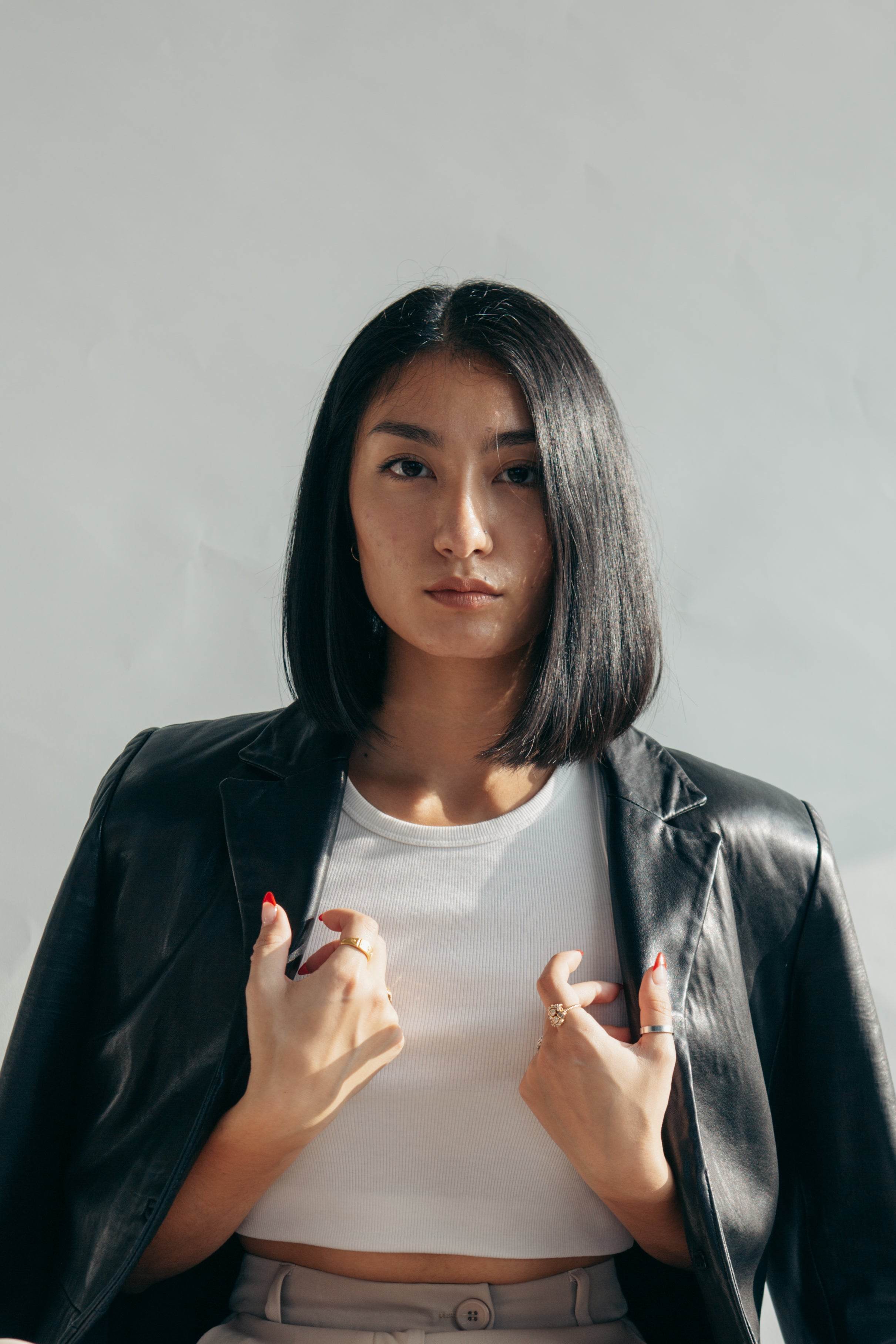 model-with-leather-jacket-over-shoulders - Odelis London